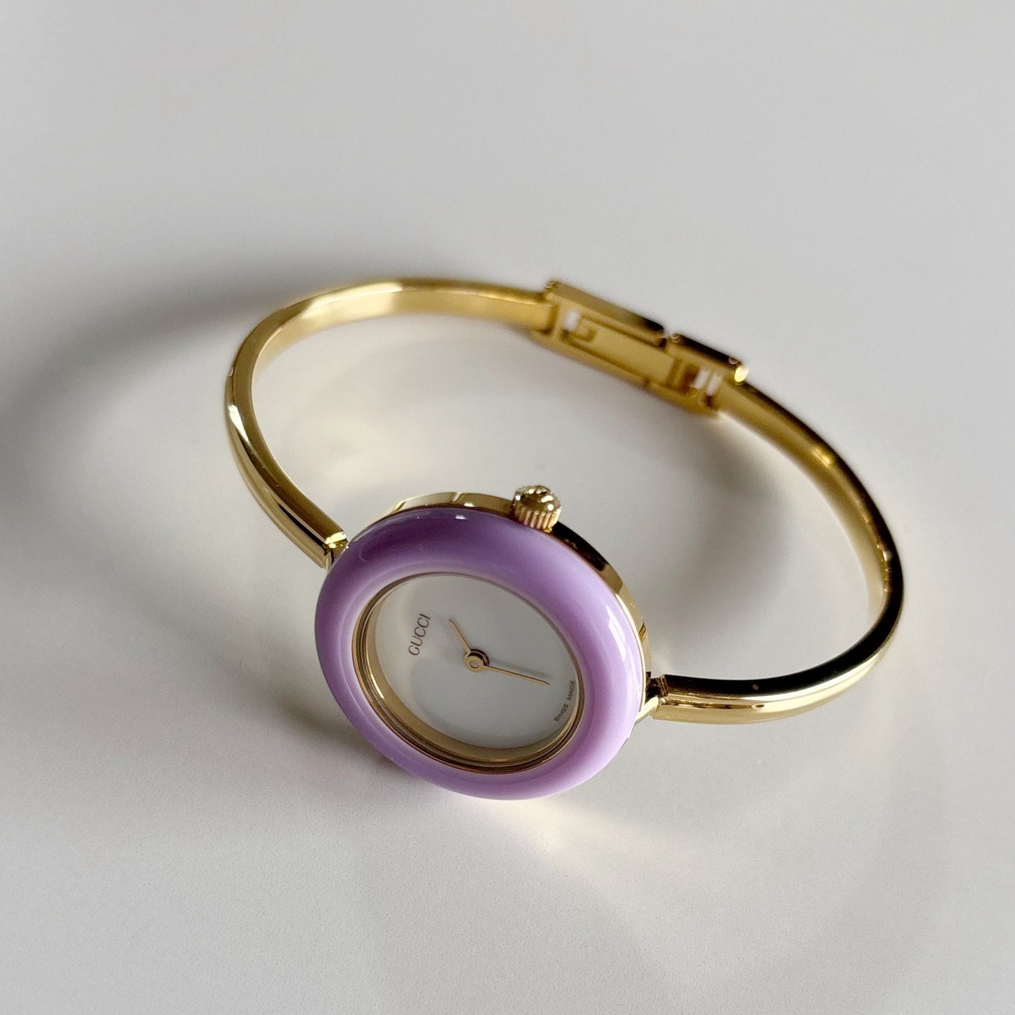 Gucci 1990s Interchangeable Bezel Gold Plated Bangle Watch with 12 bezels, case
