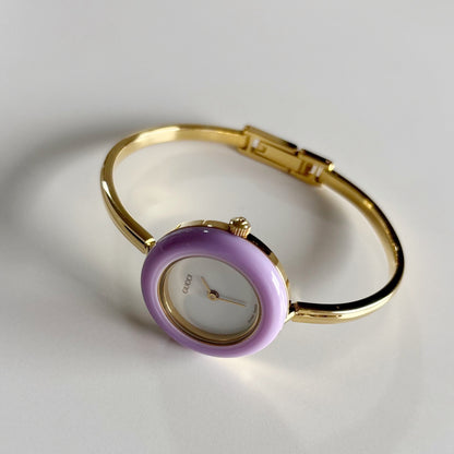 Gucci 1990s Interchangeable Bezel Gold Plated Bangle Watch with 12 bezels, case