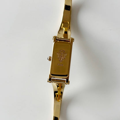 Gucci 1990s Rectangular Black Dial Gold Plated Bangle Watch
