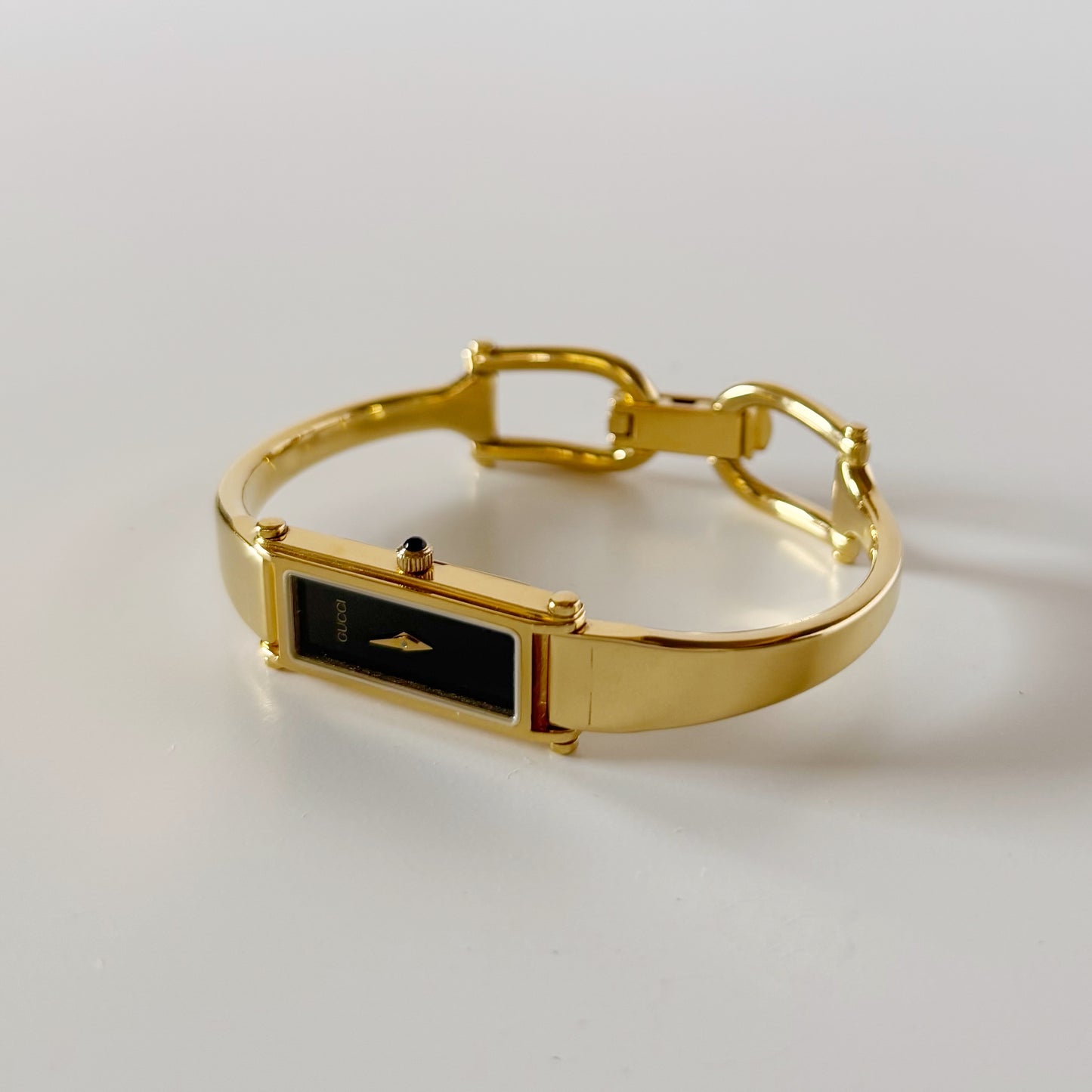 Gucci 1990s Black Dial Gold Plated Bangle Watch