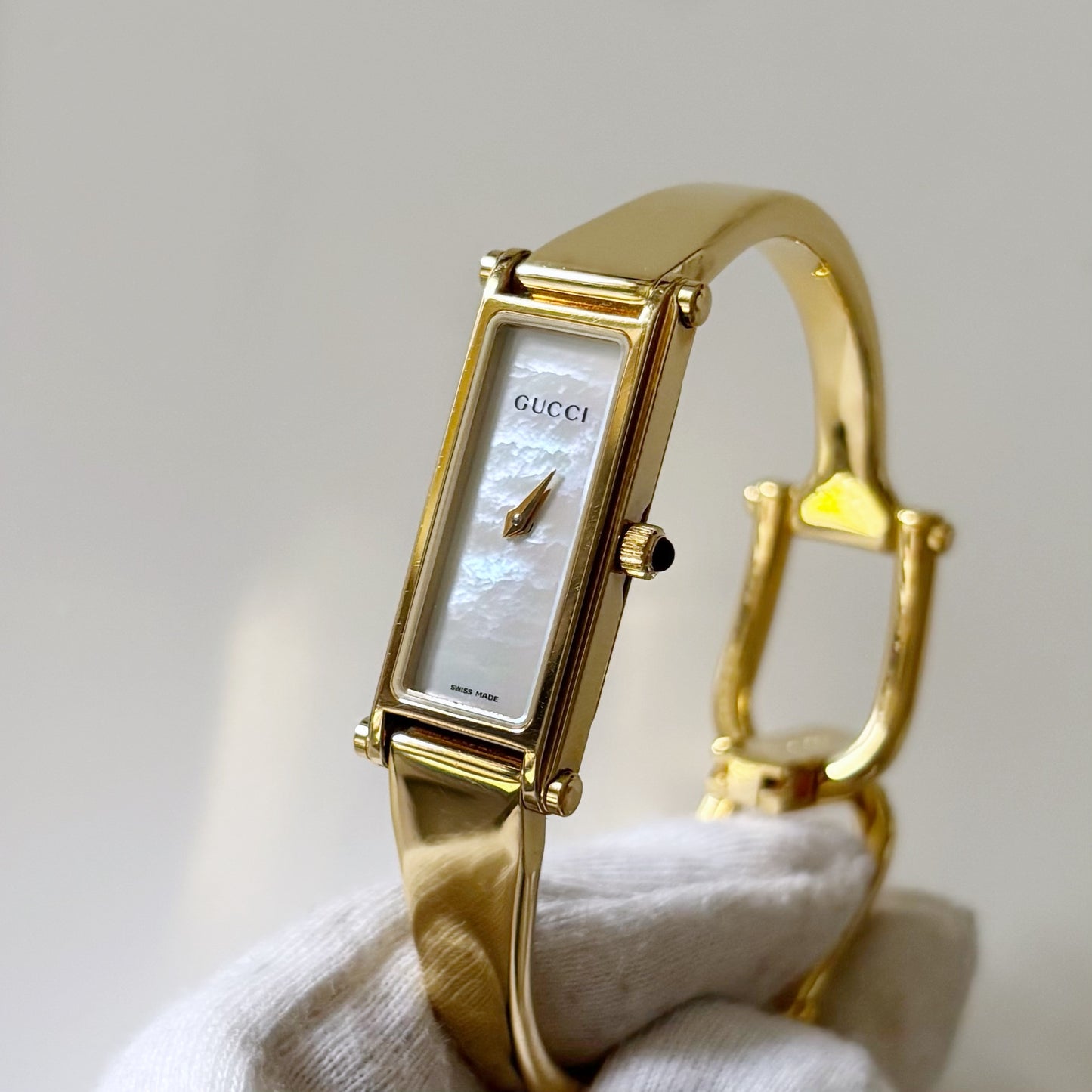 Gucci 1990s Seashell Dial Rectangular Gold Plated Bangle Watch