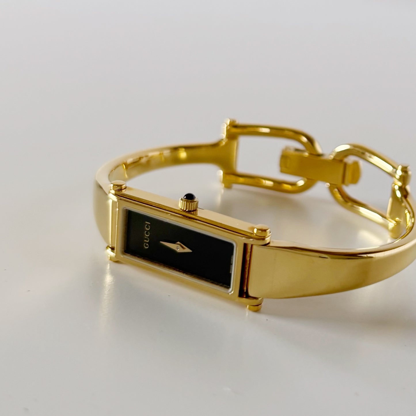Gucci 1990s Black Dial Gold Plated Bangle Watch