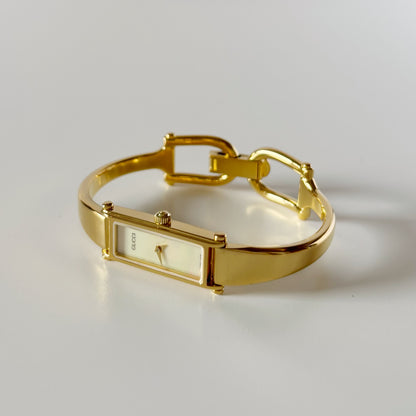 Gucci 1990s Seashell Rectangular Dial Gold Plated Bangle Watch