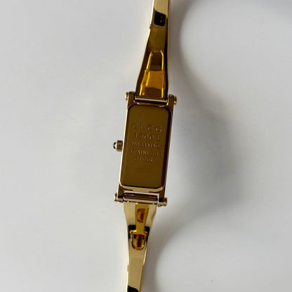 Gucci 1990s Black Rectangular Dial Gold Plated Bangle Watch