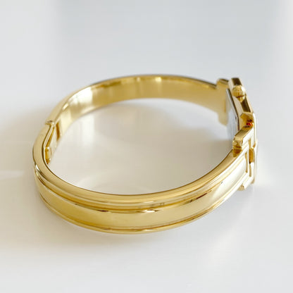 Givenchy 1990s Navy Dial Gold Plated Bangle Watch