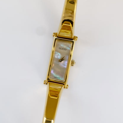 Gucci 1990s Rectangular Seashell Dial Gold Plated Bangle Watch