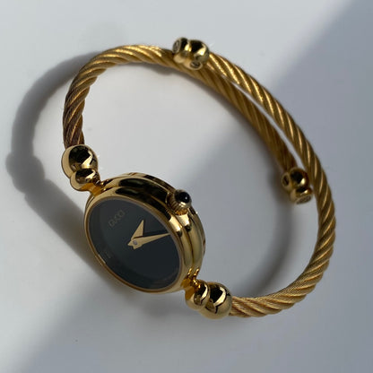 Gucci 1990s Black Dial Gold Plated Cable Bangle Watch