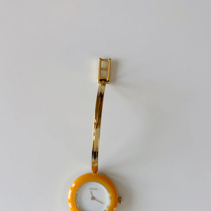Gucci 1990s Interchangeable Bezel Gold Plated Bangle Watch with 12 bezels, case