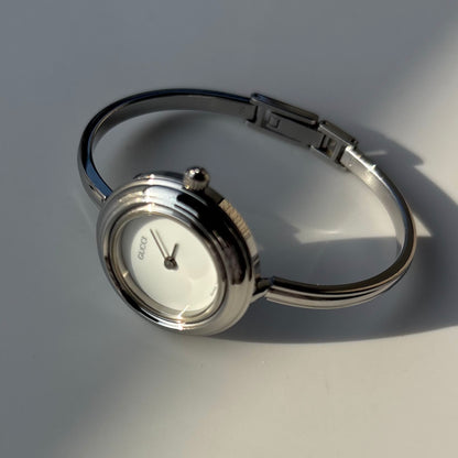 Gucci 1990s Interchangeable Bezel Stainless steel Bangle Watch with 12 bezels, case (Small)