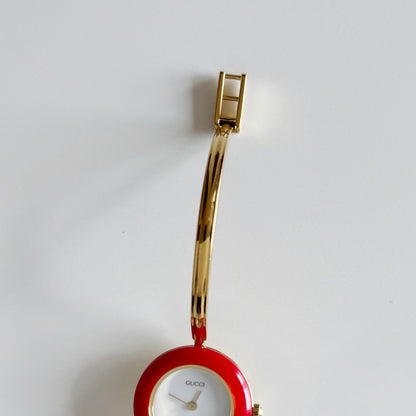 Gucci 1990s Interchangeable Bezel Gold Plated Bangle Watch with 12 bezels, case