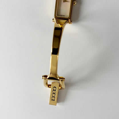 Gucci 1990s Seashell Rectangular Dial Gold Plated Bangle Watch