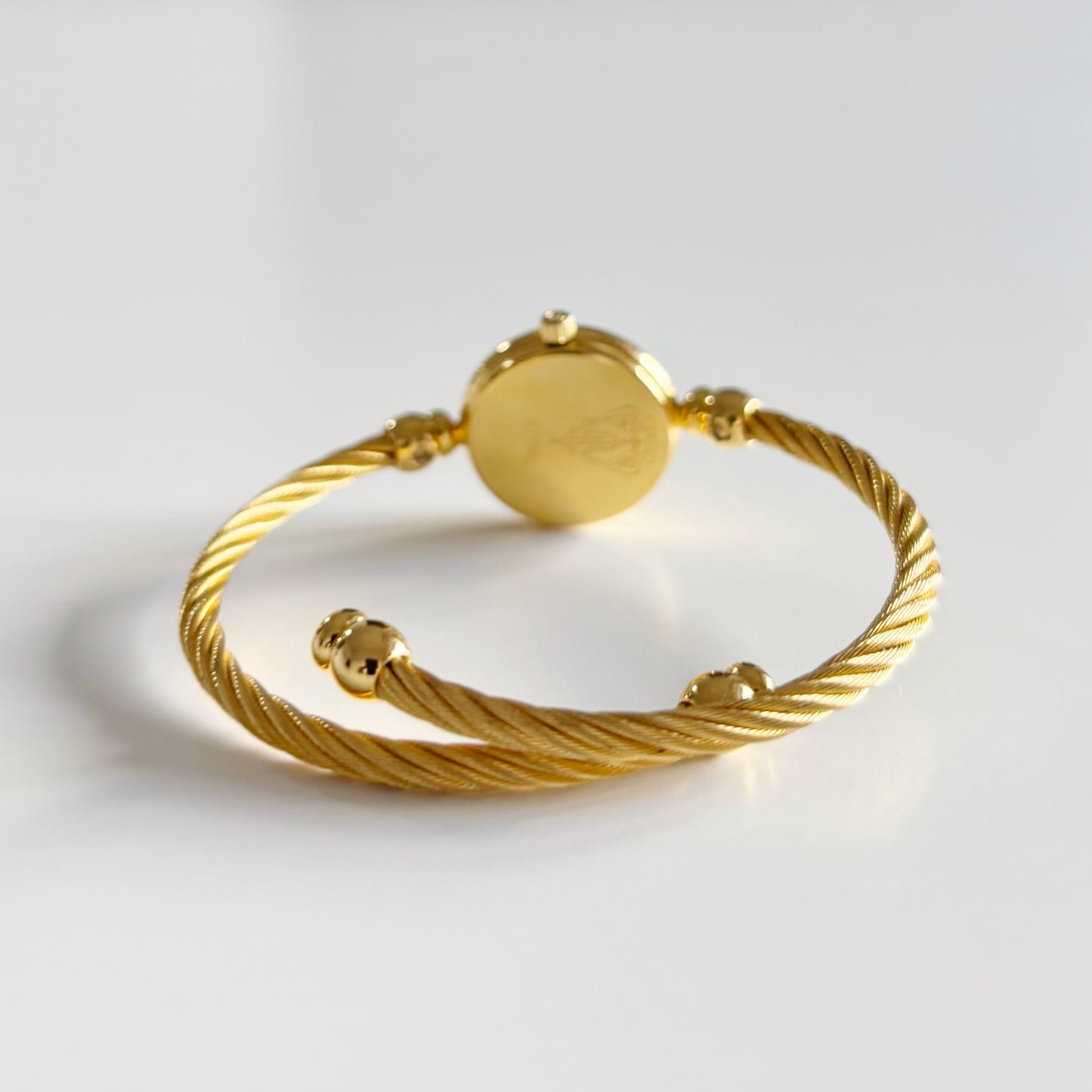 Gucci 1990s Seashell Dial Gold Plated Cable Band Bangle Watch