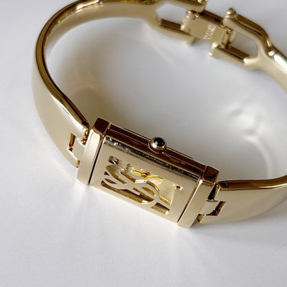 Yves Saint Laurent 1990s Peek a boo Gold Plated Bangle Watch