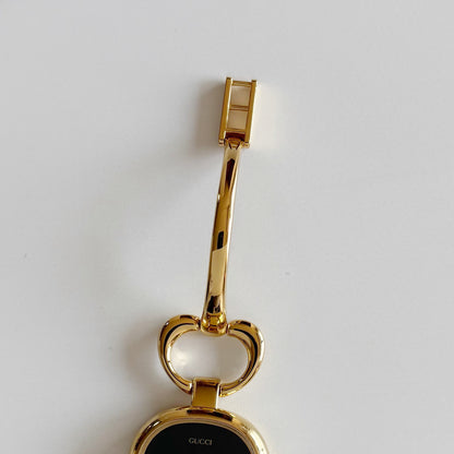 Gucci 1990s Oval Black Dial Gold Plated Bangle Watch (Small)