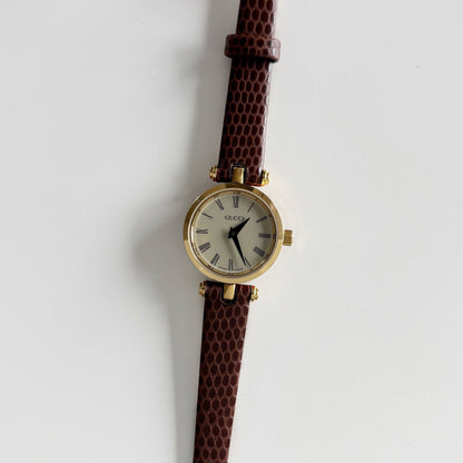 Gucci 1990s Sherry Round Dial Gold Plated Watch