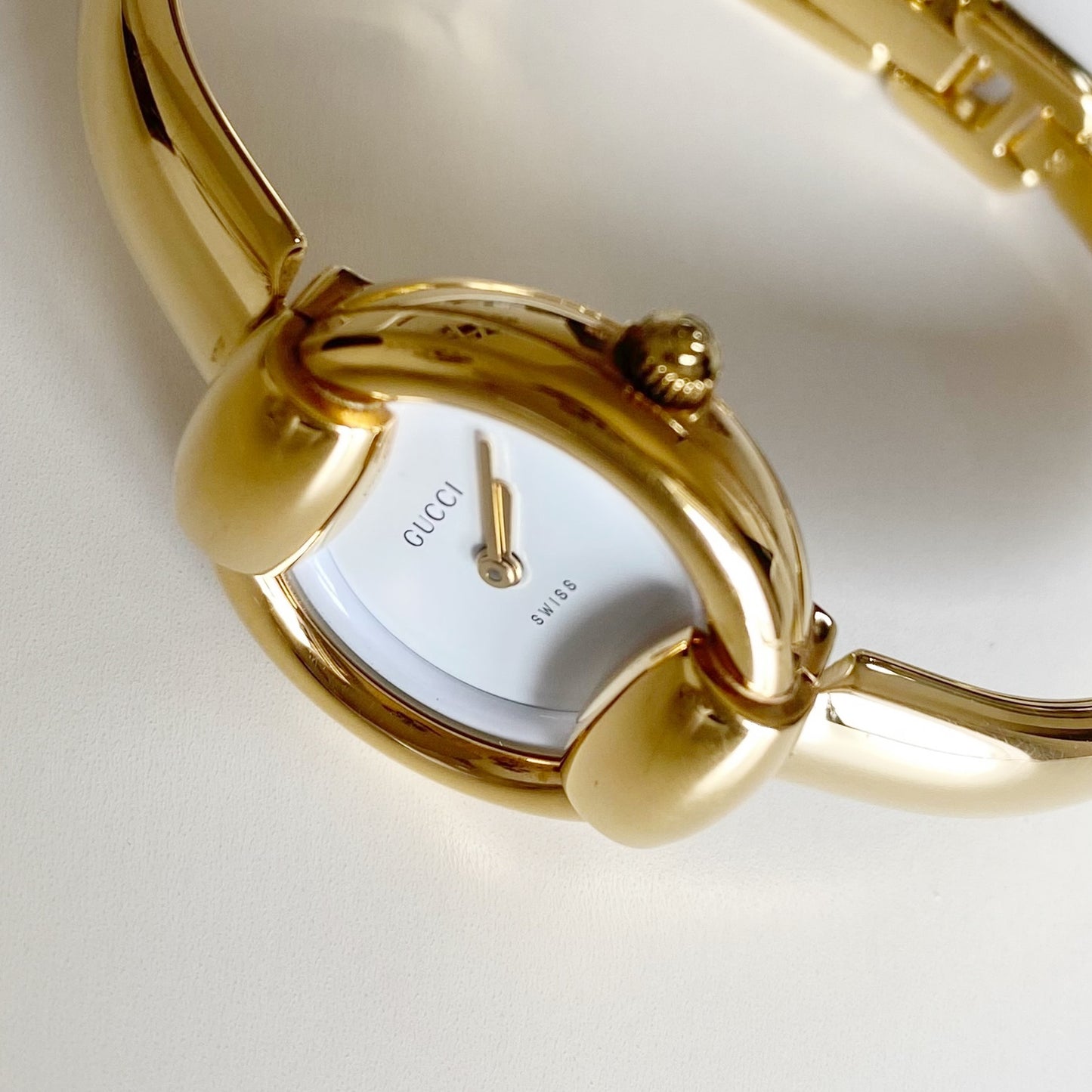 Gucci 1990s Round Dial Gold Plated Bangle Watch
