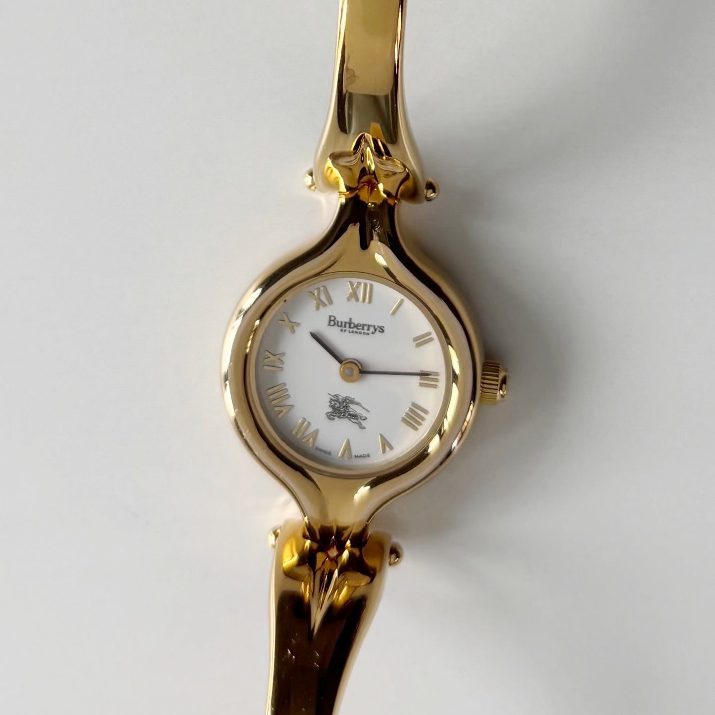 Burberry 1990s Round Dial Gold Plated Bangle Watch