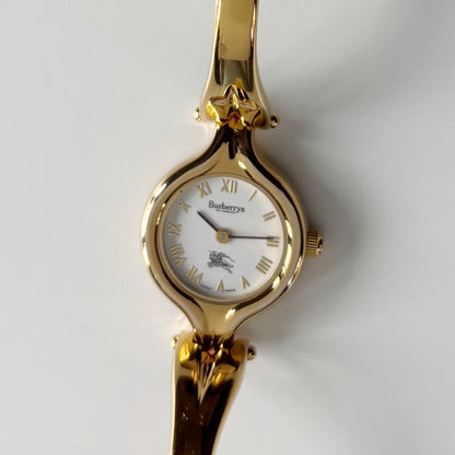 Burberry 1990s Round Dial Gold Plated Bangle Watch