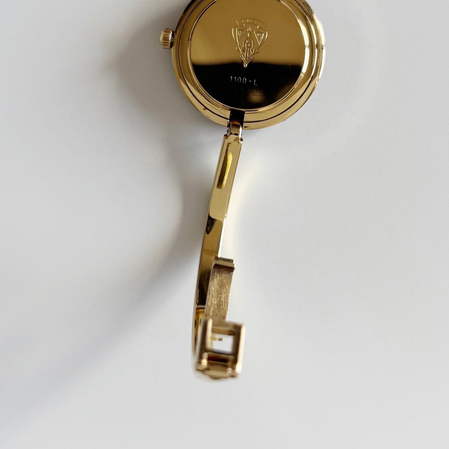 Gucci 1990s Interchangeable Bezel Gold Plated Bangle Watch with 12 bezels, case