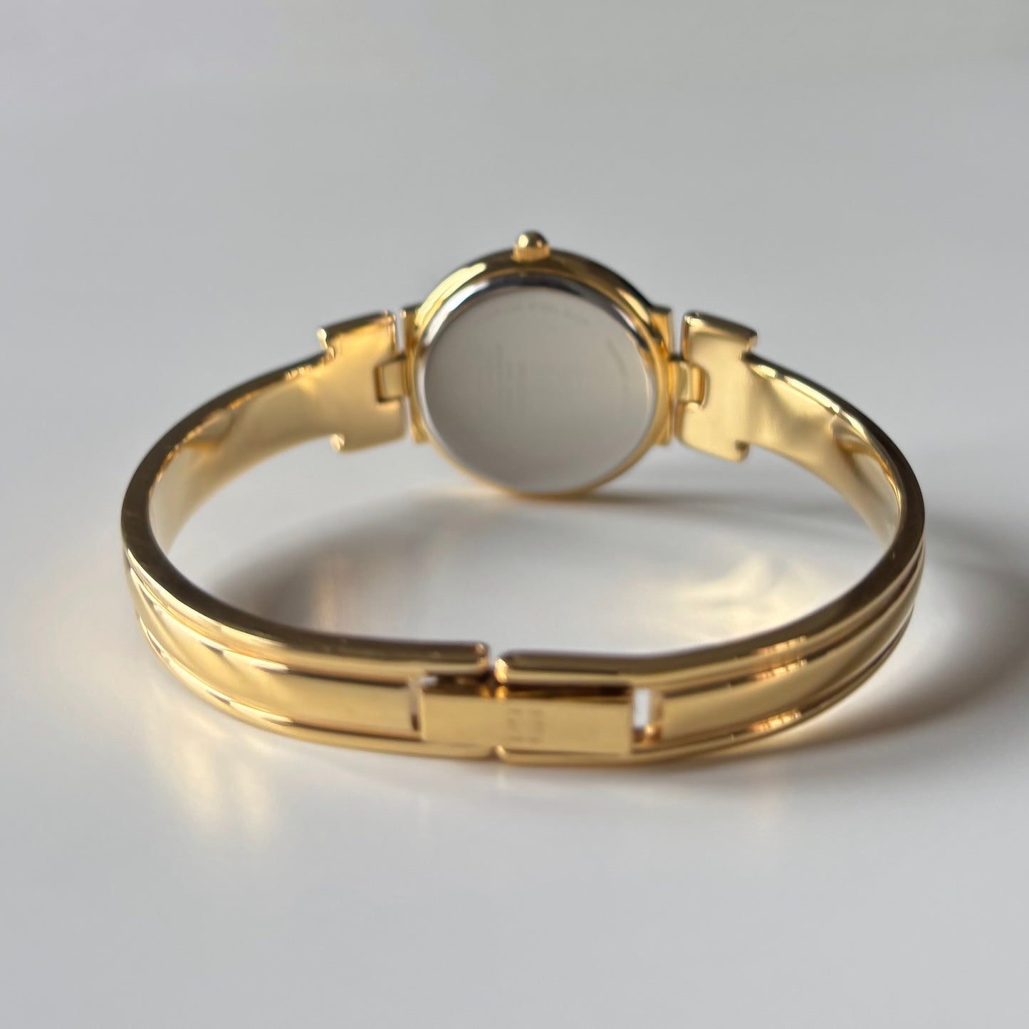 Givenchy 1990s Round Dial Gold Plated Bangle Watch