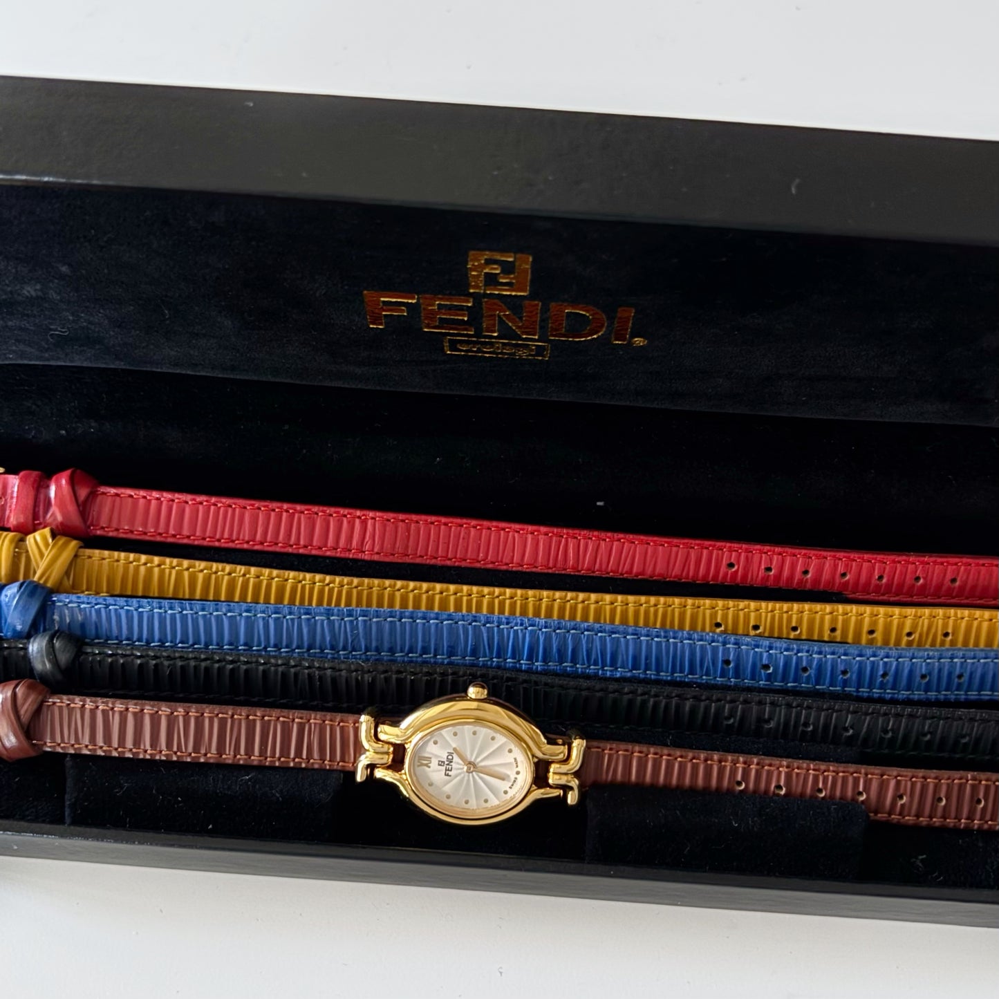 Fendi 1990s Interchangeable Belt Oval Gold Plated Watch with 5 belt straps, case