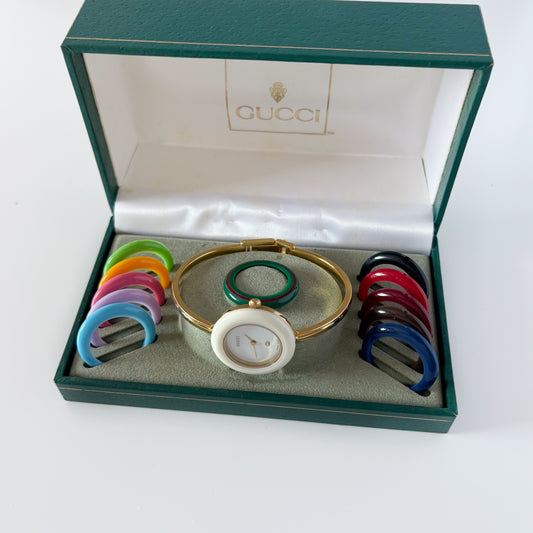 Gucci 1990s Interchangeable Bezel Gold Plated Bangle Watch with 12 bezels, case