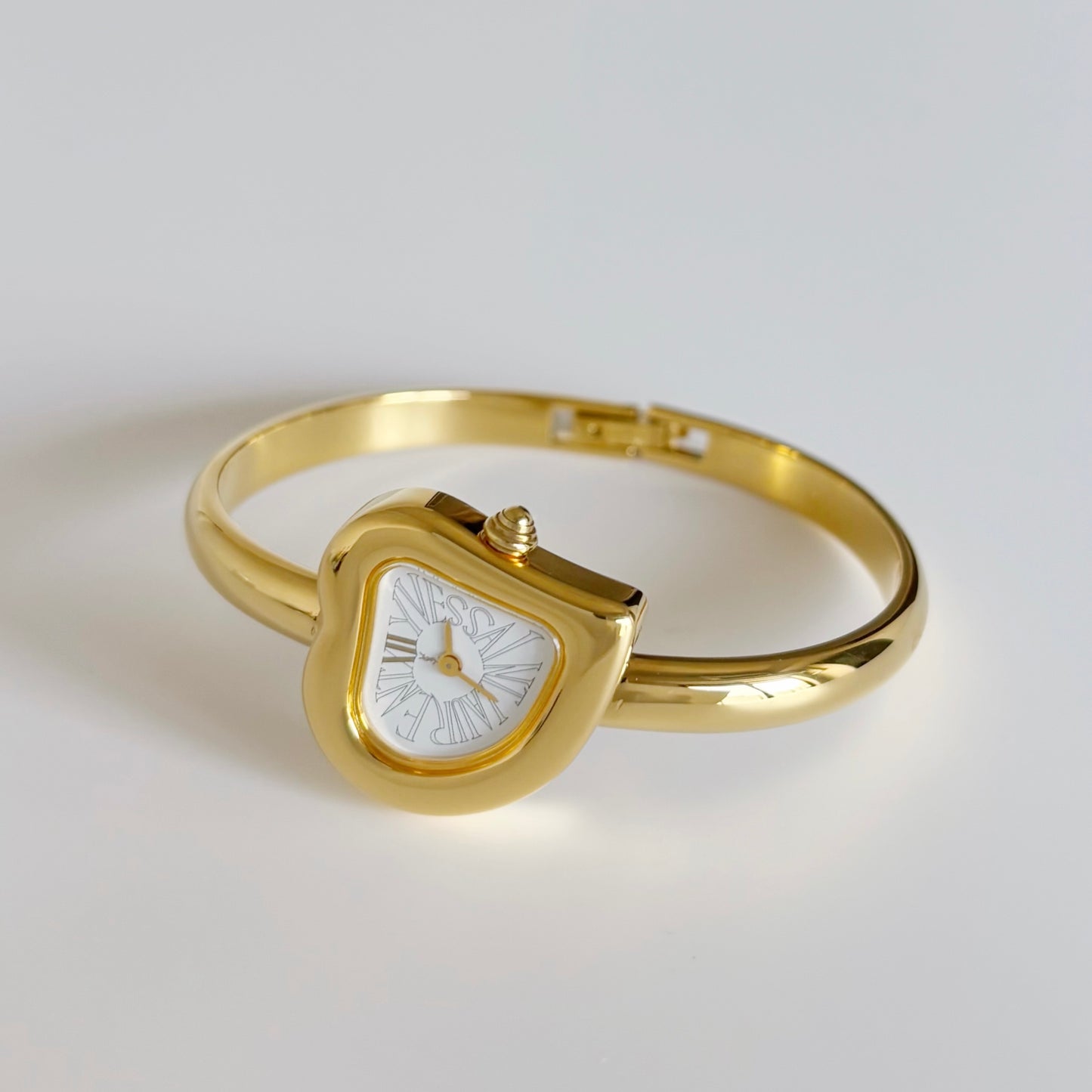 Yves Saint Laurent 1990s Heart Shaped Gold Plated Bangle Watch