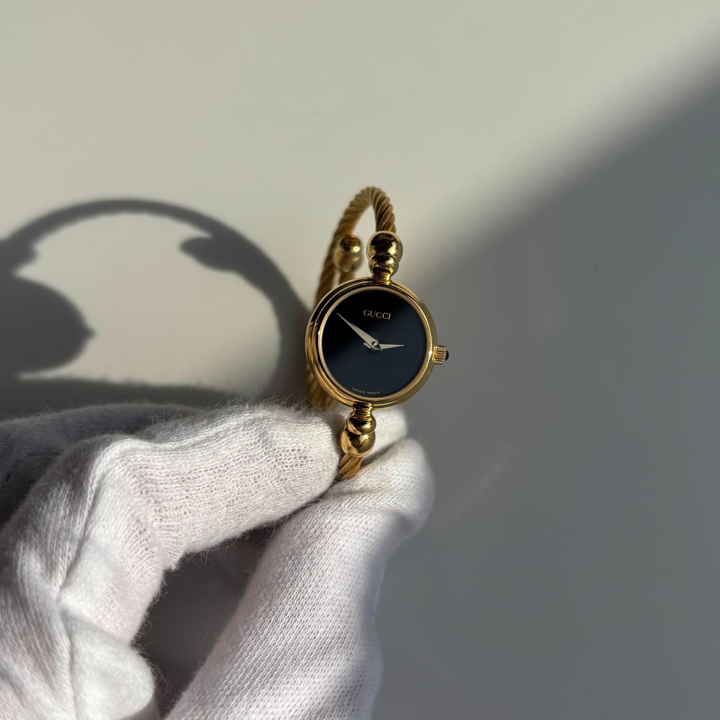 Gucci 1990s Black Dial Gold Plated Cable Band Bangle Watch