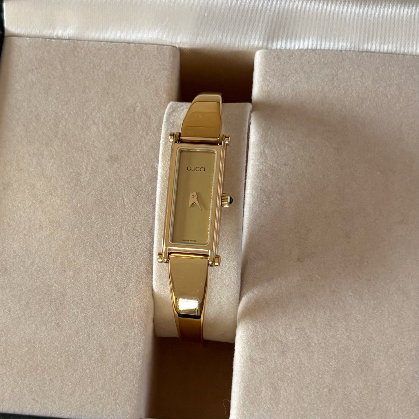 Gucci 1990s Gold Rectangular Dial Gold Plated Bangle Watch