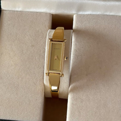 Gucci 1990s Gold Rectangular Dial Gold Plated Bangle Watch