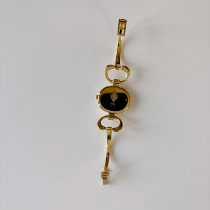 Gucci 1990s Oval Gold Dial Gold Plated Bangle Watch (Small)