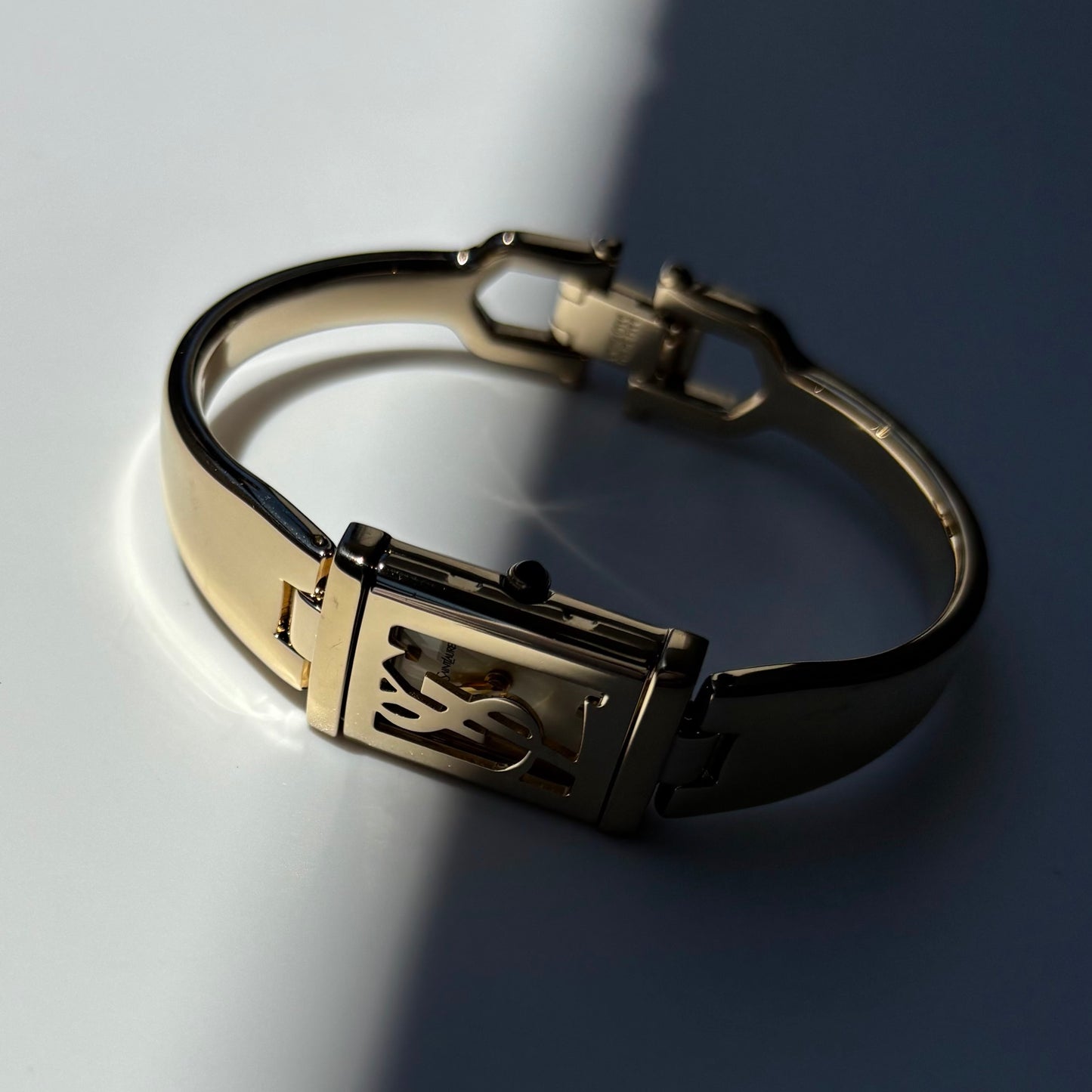 Yves Saint Laurent 1990s Peek-A-Boo Gold Plated Bangle Watch