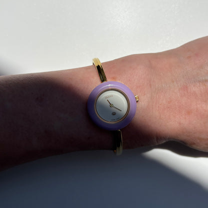 Gucci 1990s Interchangeable Bezel Gold Plated Bangle Watch with 12 bezels, case