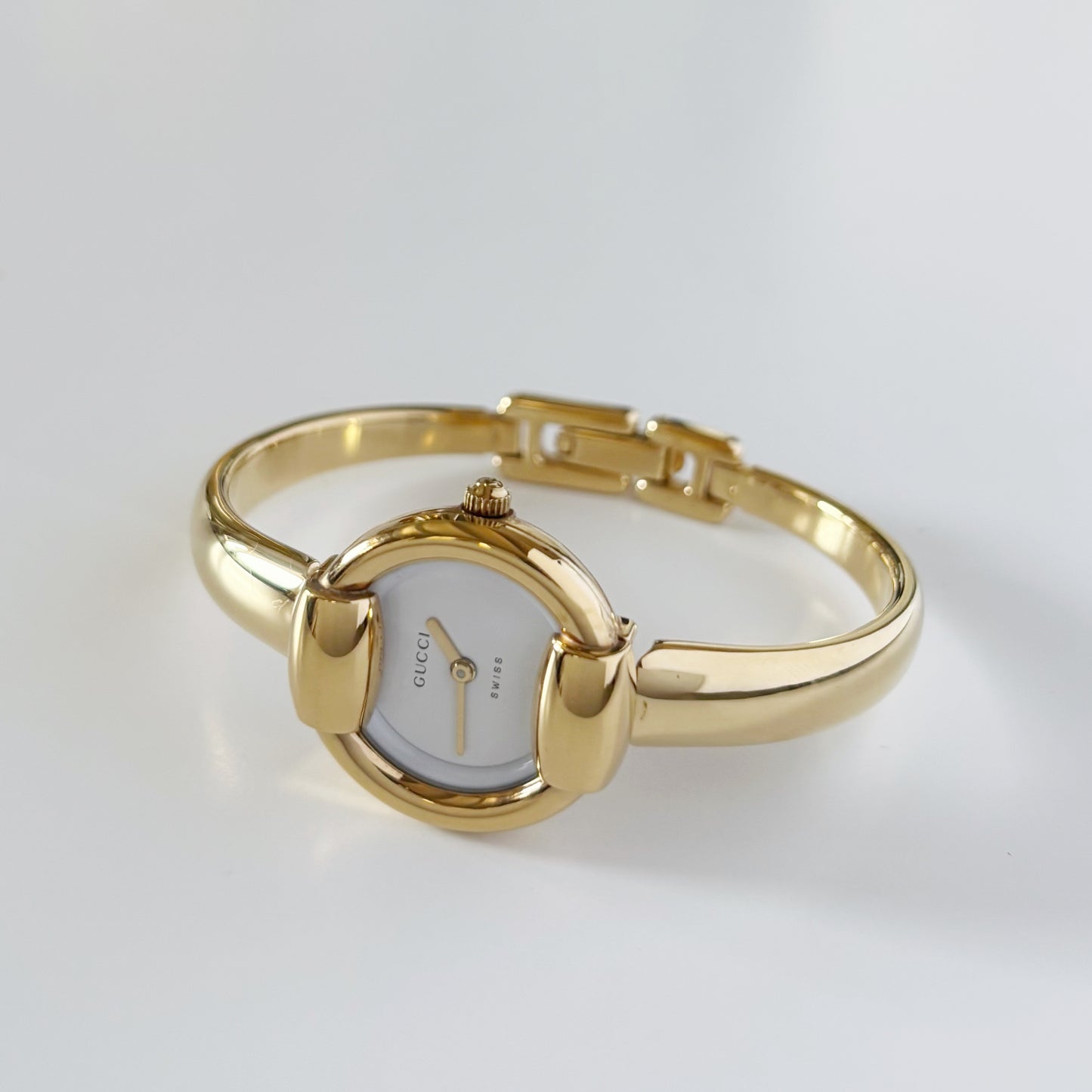 Gucci 1990s Round Dial Gold Plated Bangle Watch