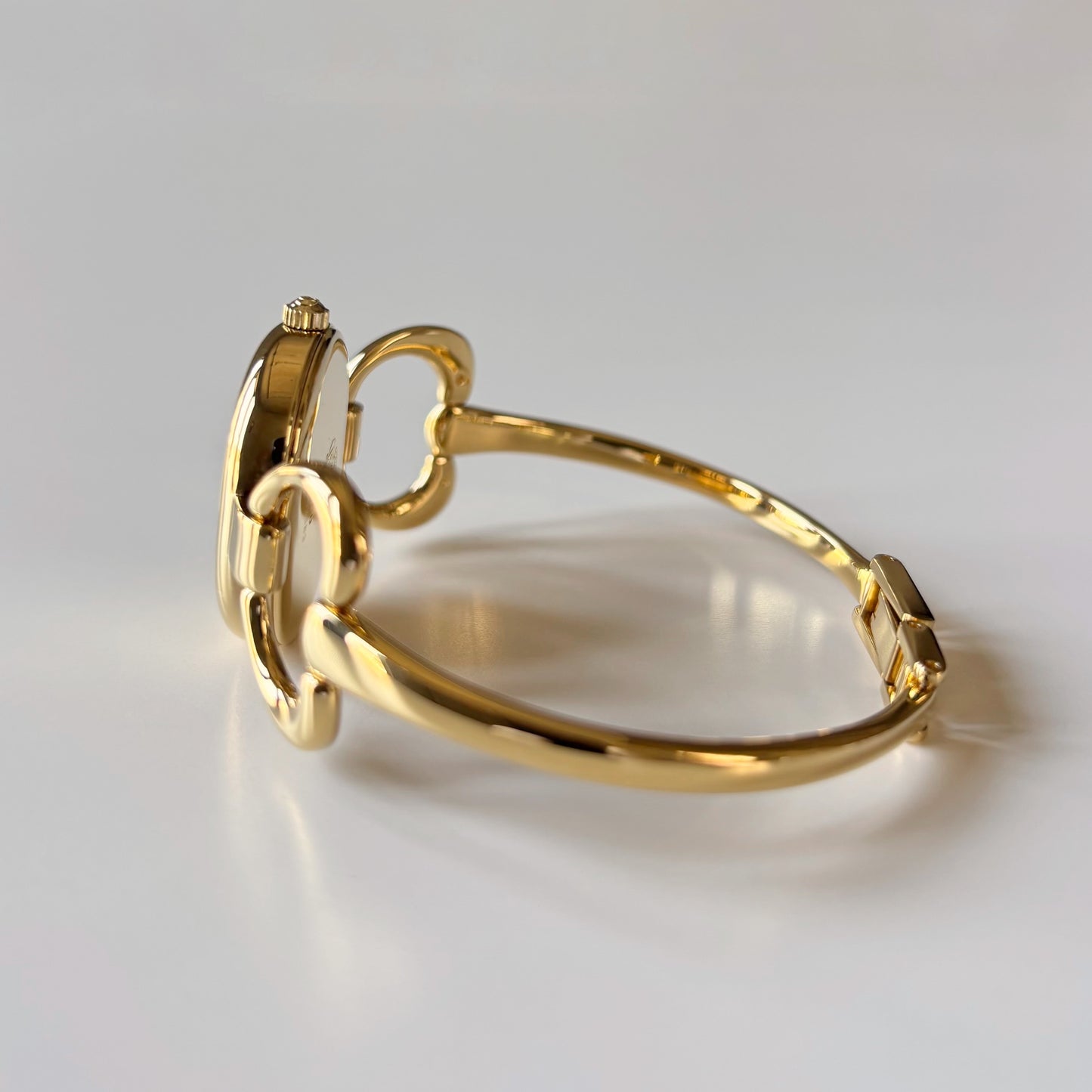 Gucci 1990s Oval Dial Gold Plated Bangle Watch