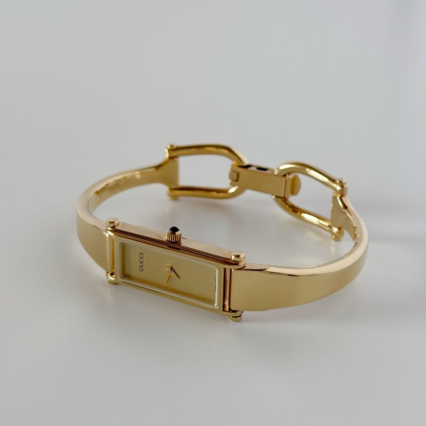 Gucci 1990s Rectangular Dial Gold Plated Bangle Watch