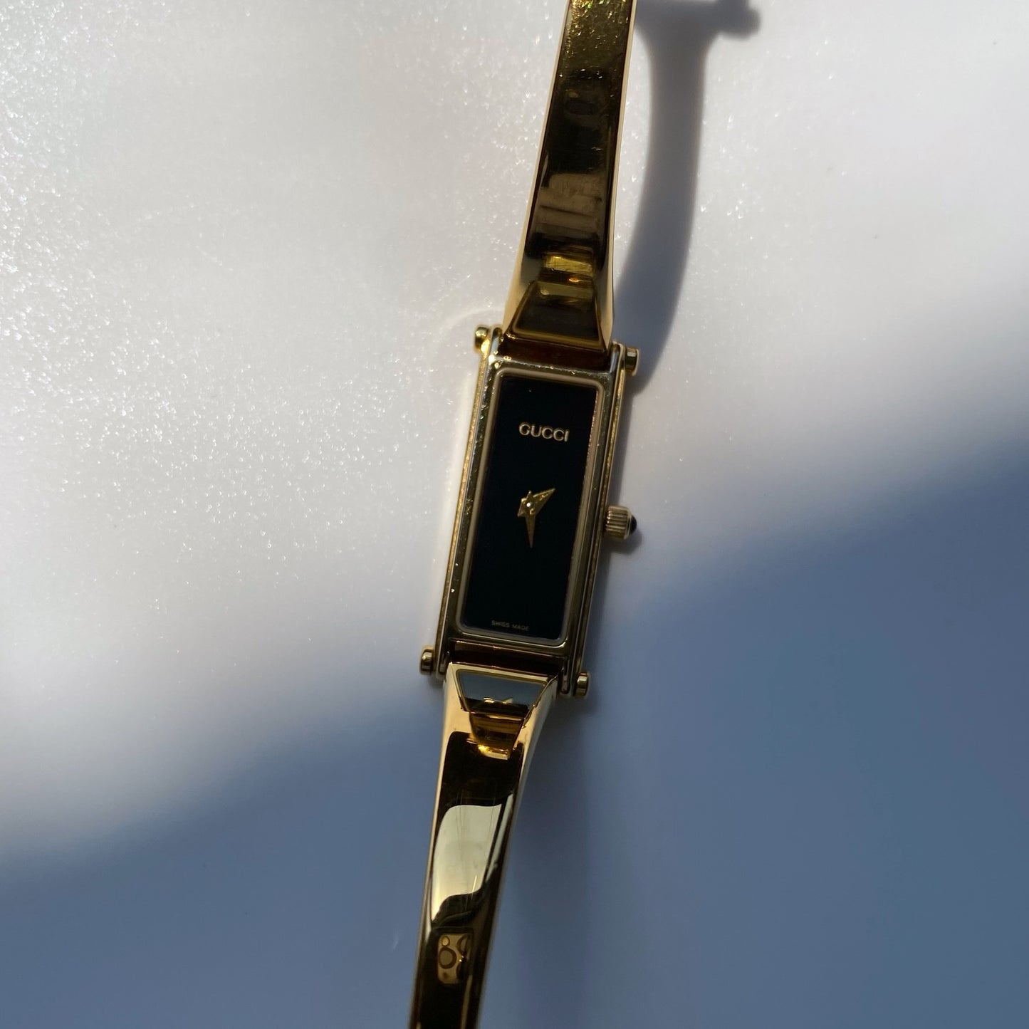 Gucci 1990s Rectangular Black Dial Gold Plated Bangle Watch