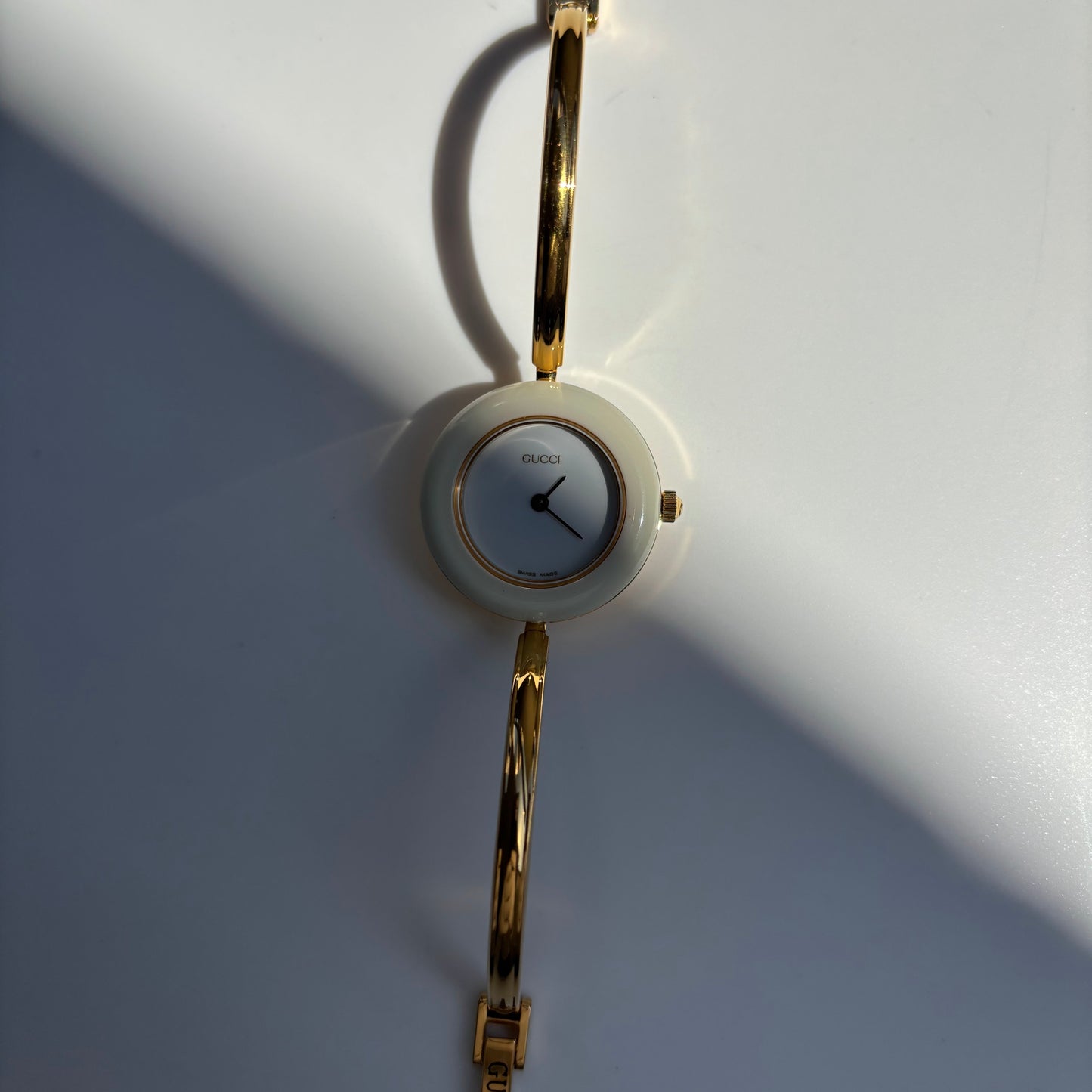 Gucci 1990s Interchangeable Bezel Gold Plated Bangle Watch with case, 12 bezels (Small)