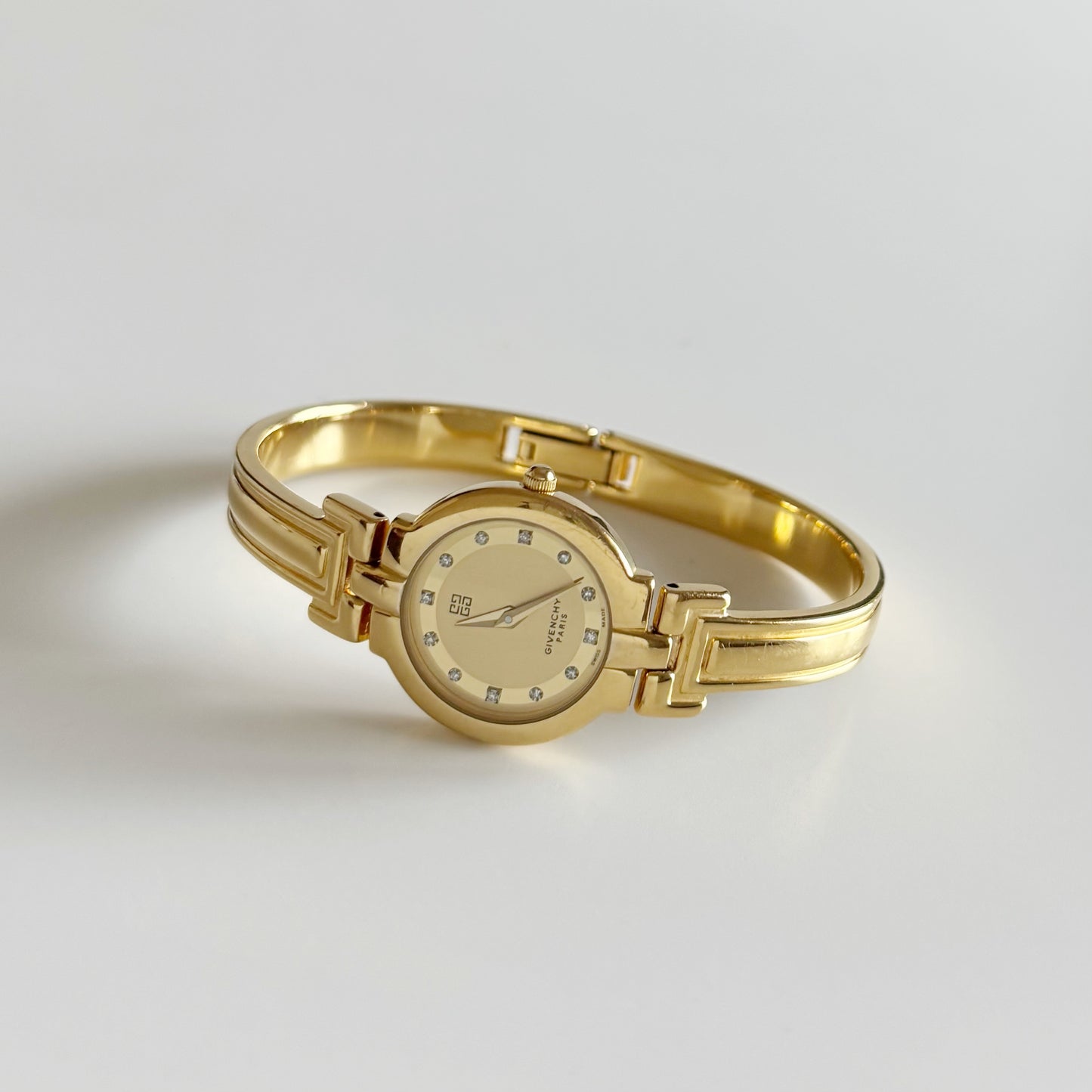 Givenchy 1990s Round Dial Gold Plated Bangle Watch