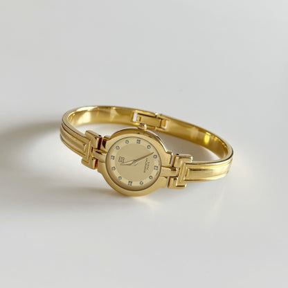 Givenchy 1990s Round Dial Gold Plated Bangle Watch