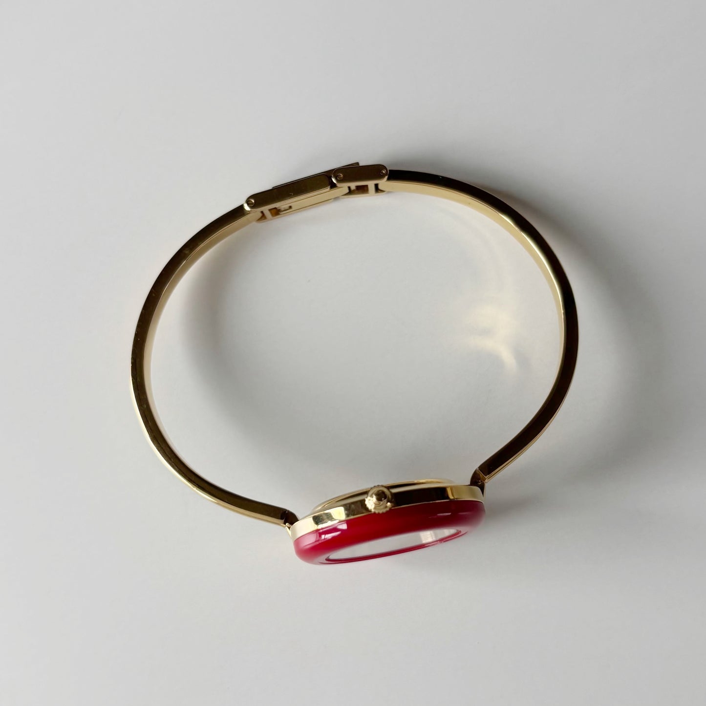 Gucci 1990s Interchangeable Bezel Gold Plated Bangle Watch with 12 bezels, case