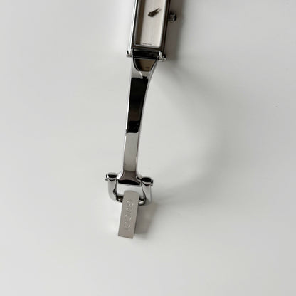 Gucci 1990s Rectangular Dial Silver Bangle Watch