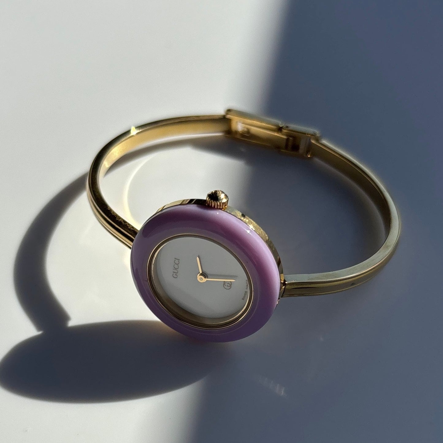 Gucci 1990s Interchangeable Bezel Gold Plated Bangle Watch with 12 bezels, case