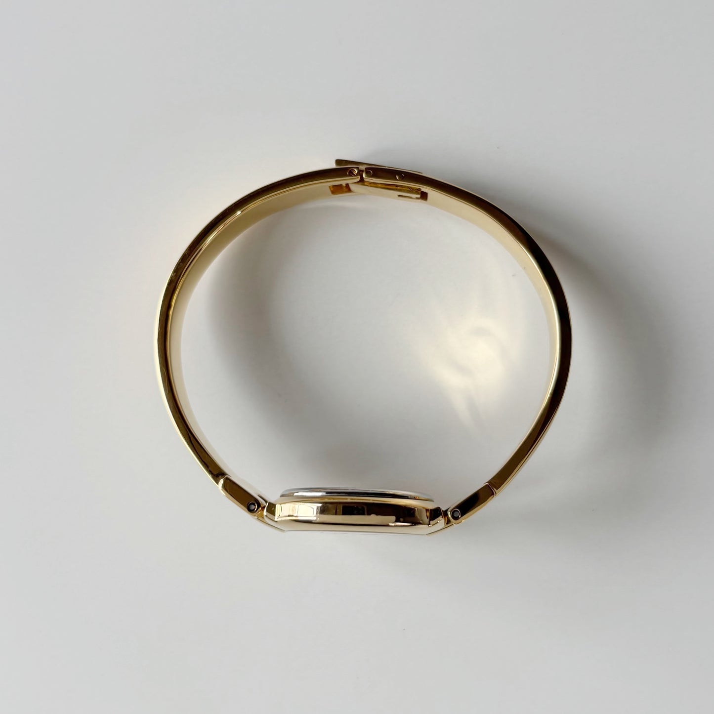 Givenchy 1990s Round Dial Gold Plated Bangle Watch