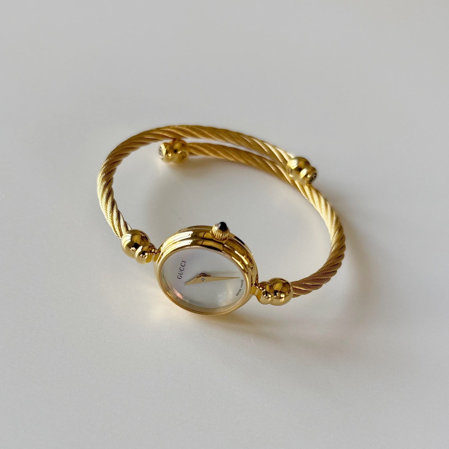 Gucci 1990s Seashell Dial Gold Plated Cable Bangle Watch