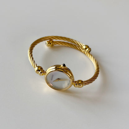 Gucci 1990s Seashell Dial Gold Plated Cable Bangle Watch