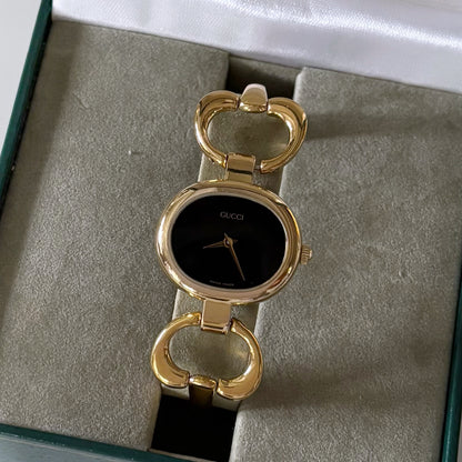 Gucci 1990s Black Dial Gold Plated Bangle Watch