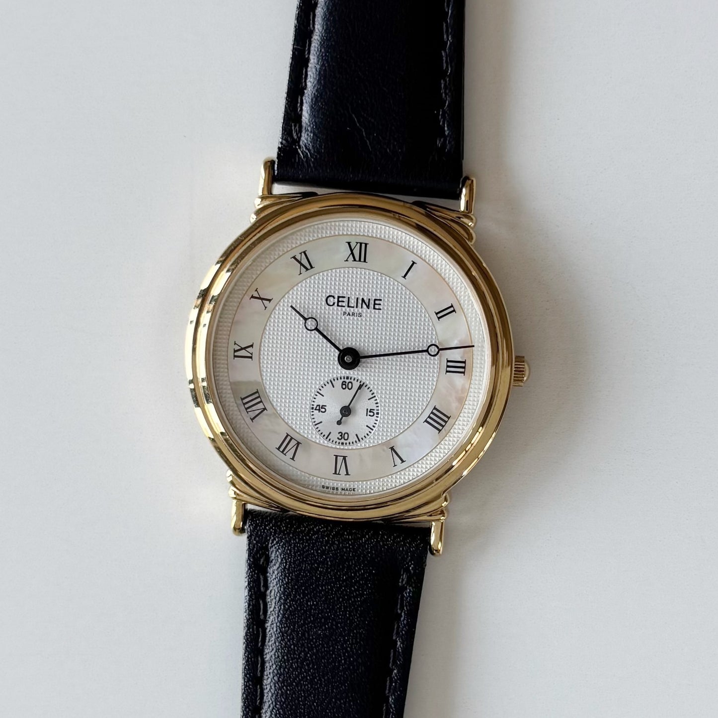 Celine 1990s Seashell Round Dial Gold Plated Watch (Large)