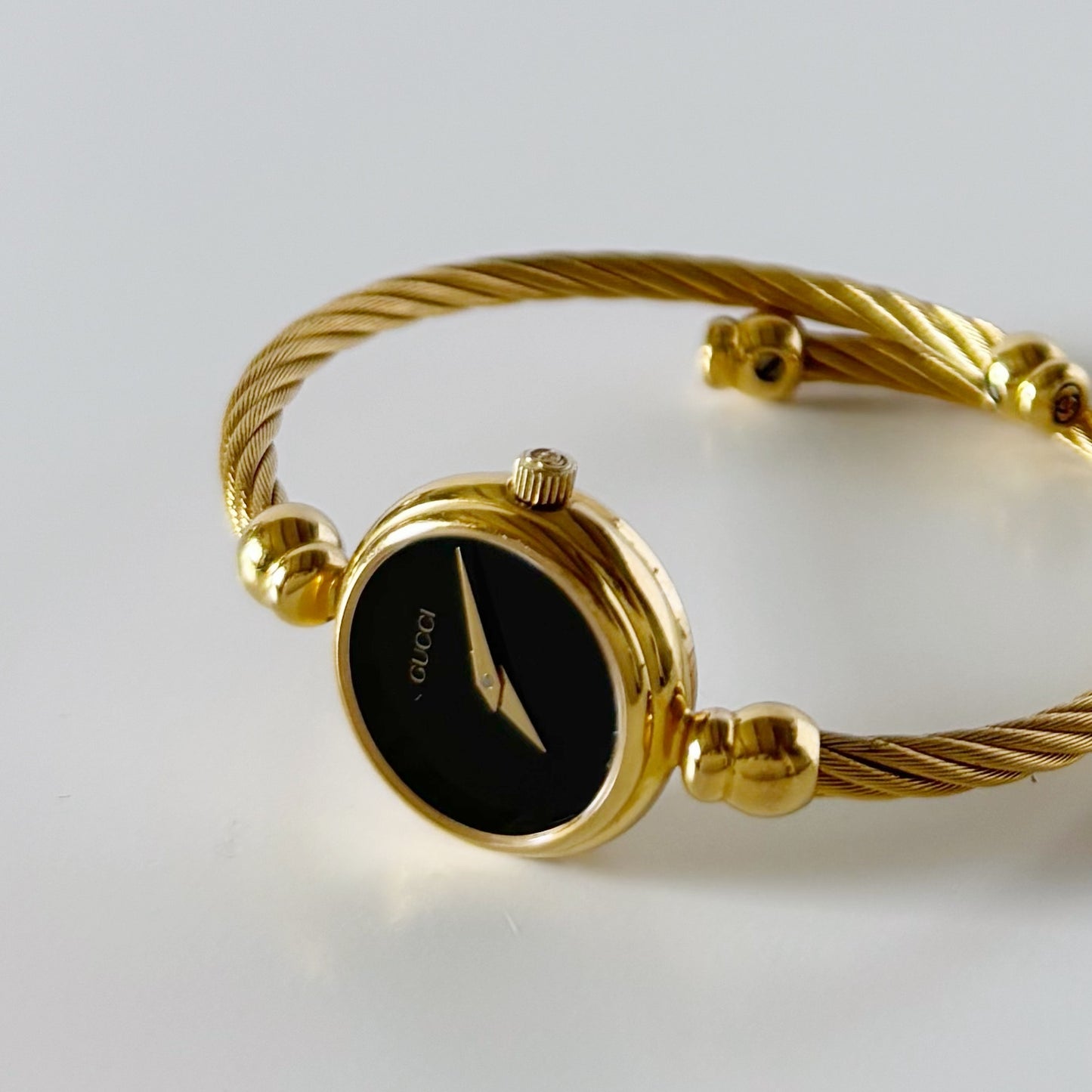 Gucci 1990s Black Dial Gold Plated Cable Bangle Watch