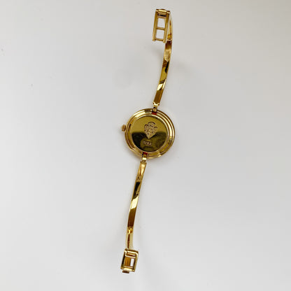 Gucci 1990s Interchangeable Bezel Gold Plated Bangle Watch with 12 bezels, case